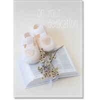 On Your Dedication - Baby Shoes With Blossom On Bible